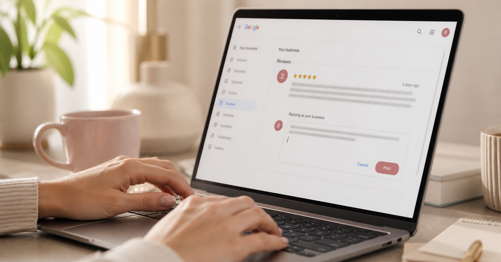Salon owner replying to a Google review on a laptop with calm, focused attention