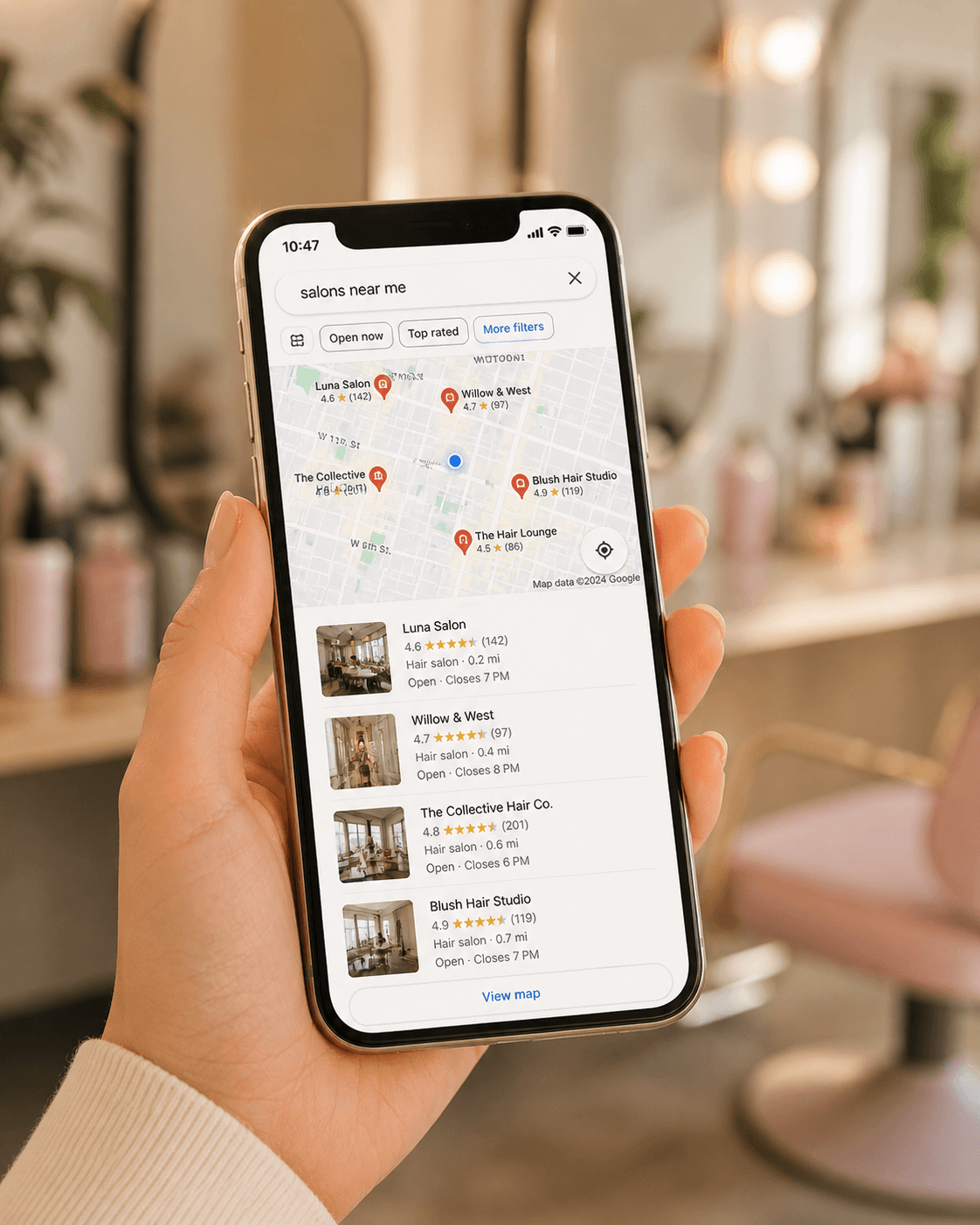 Phone displaying Google Maps search results for salons near current location