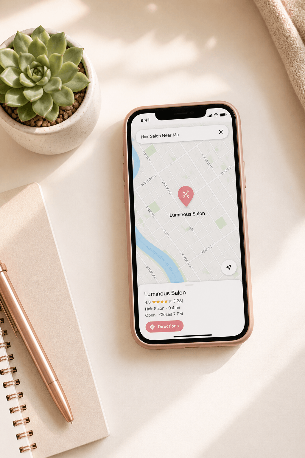 Phone displaying Google Maps with salon location pins in a local search